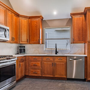 Austin Home Remodeling with Quartz Splash in Kitchen