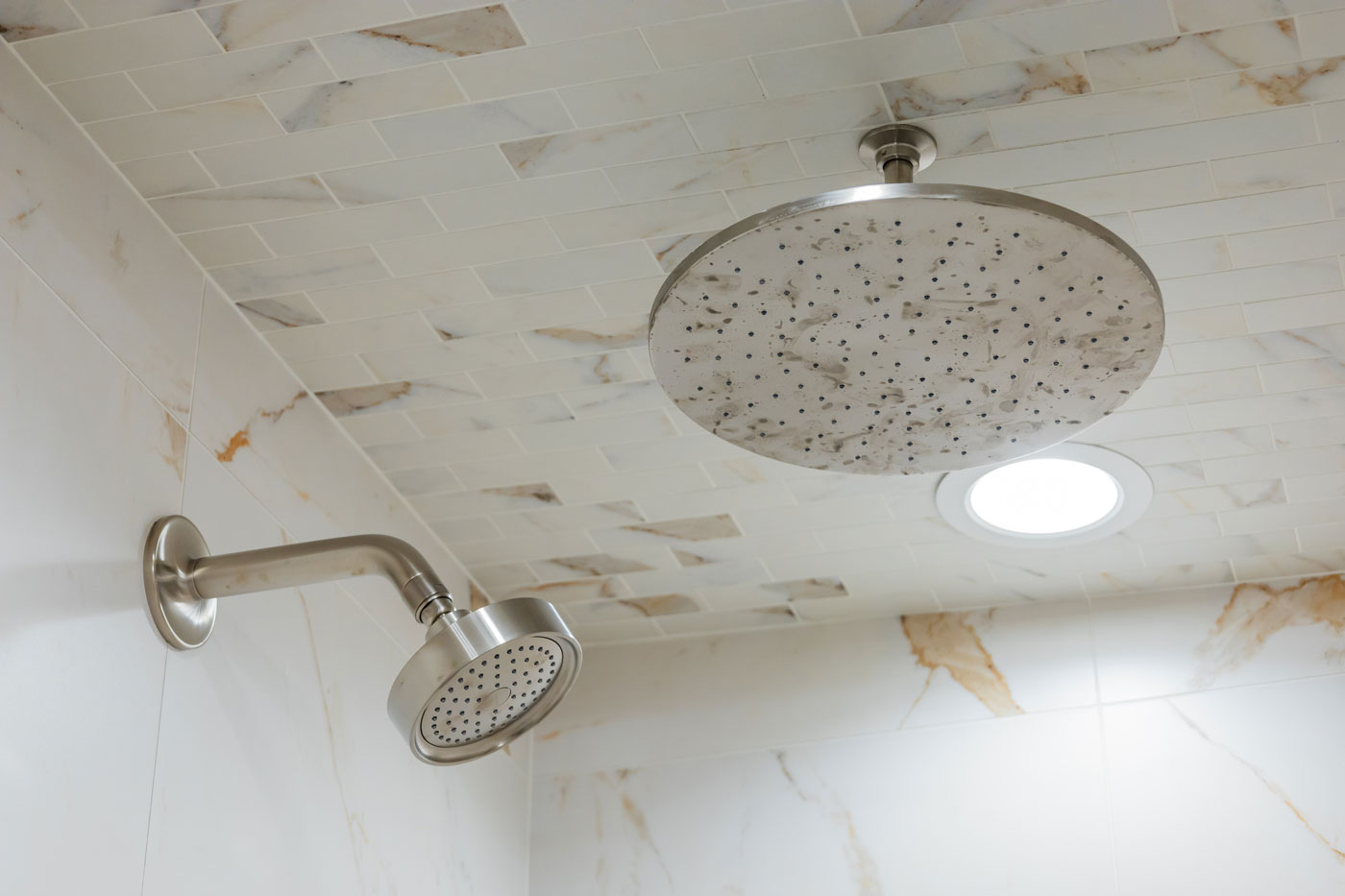 Austin Home Remodeler shows master bath shows tiled ceiling in shower